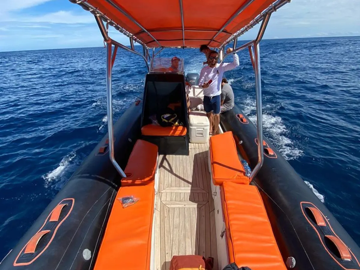 a small boat in a body of water