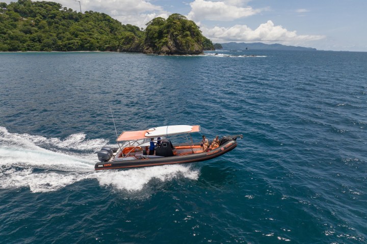a small boat in a body of water