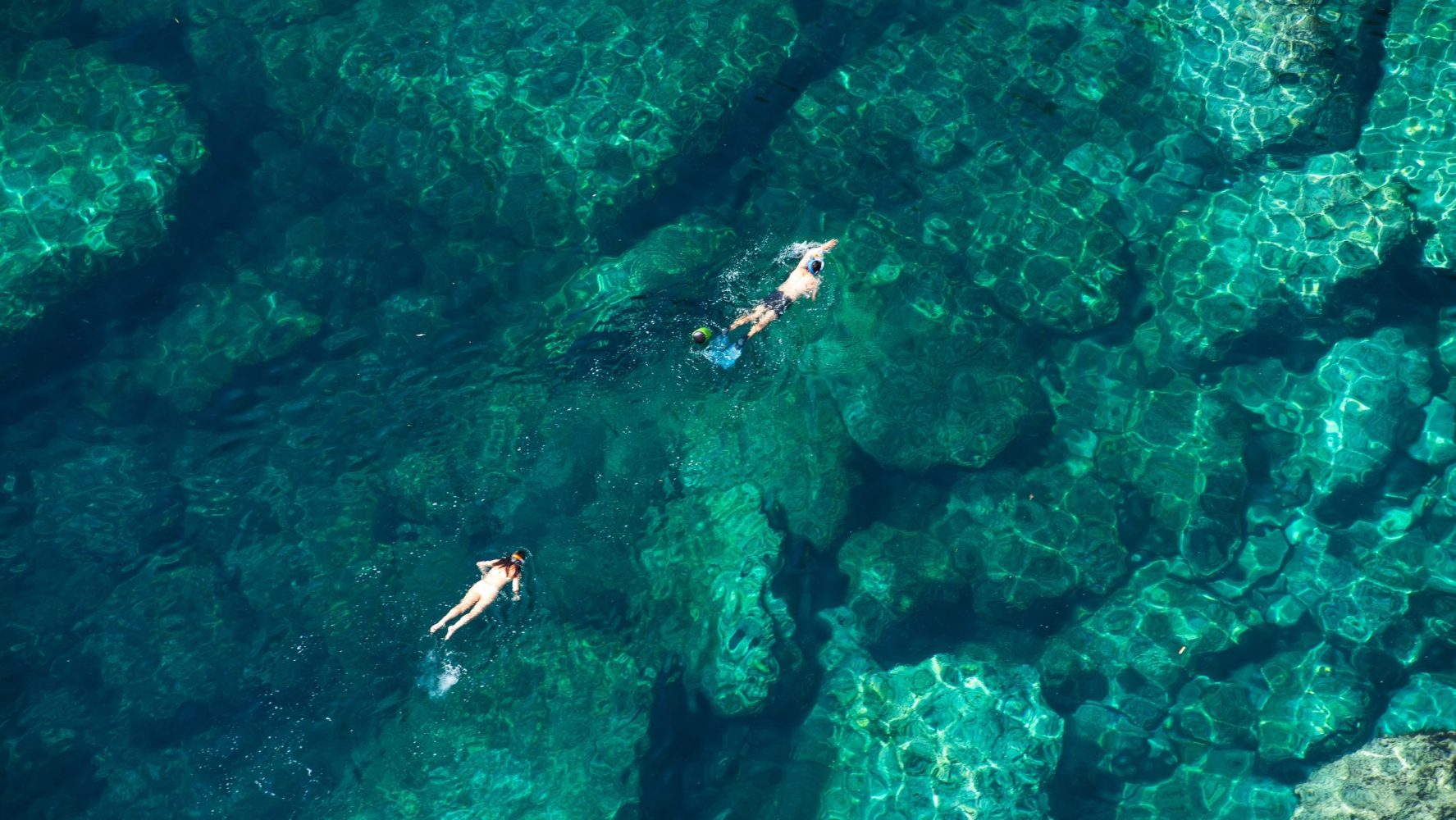 underwater view of a large rock