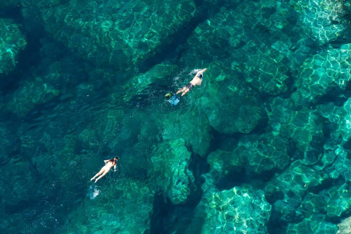 underwater view of a large rock