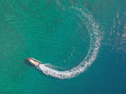 a person riding a wave on a surfboard in the water