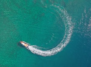 a person riding a wave on a surfboard in the water