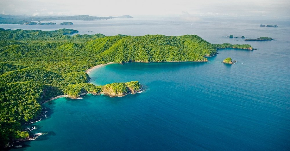 a small island in the middle of a body of water